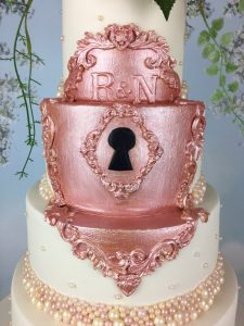rose gold lock wedding cake